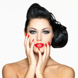 fashion woman with red lips, nails and creative hairstyle