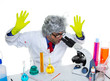 Crazy mad nerd scientist at laboratory microscope