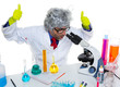 Crazy mad nerd scientist at laboratory microscope