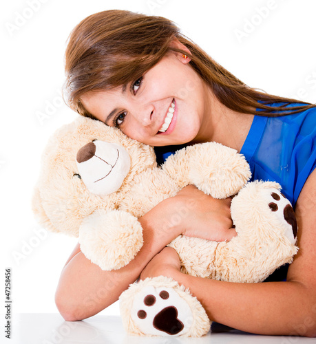 Photo: Sweet woman with a teddy bear Sweet woman with a teddy bear