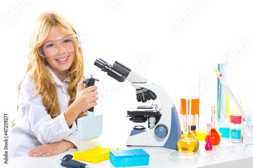 Photo: Children student girl in kid chemical laboratory Children student girl in kid chemical laboratory