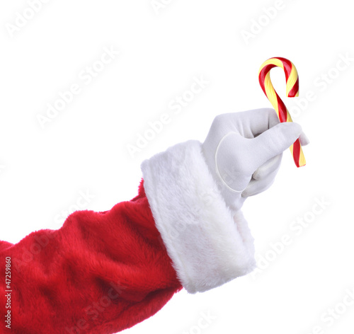 Photo: Santa with Old Fashioned Candy Cane Santa with Old Fashioned Candy Cane