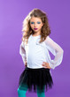 Children fashion makeup kid girl on purple