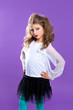 Children fashion makeup kid girl on purple