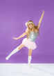Children fashiondoll spring girl dancing on purple