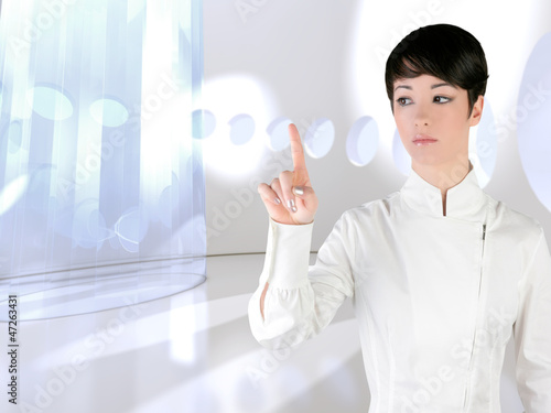 Photo: Futuristic woman touch finger copyspace Futuristic woman touch finger copyspace
