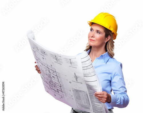 Photo: Architect woman with a plan. Architect woman with a plan.