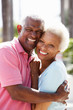 Romantic Senior Couple Hugging In  Street