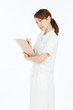 Beautiful young nurse on white background