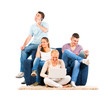 Young people sitting on the sofa with their gadgets