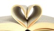 pages of a book curved into a heart