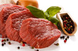 Raw beef and vegetables on white background