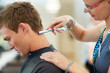 Foto: Adding the finishing touches to his hairstyle Adding the finishing touches to his hairstyle