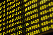 Flights information board in airport terminal