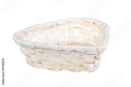 Photo: Wickerwork empty yellow breadbasket on white background Wickerwork empty yellow breadbasket on white background