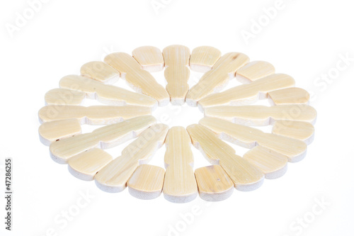 Photo: Wickerwork empty yellow breadbasket on white background Wickerwork empty yellow breadbasket on white background