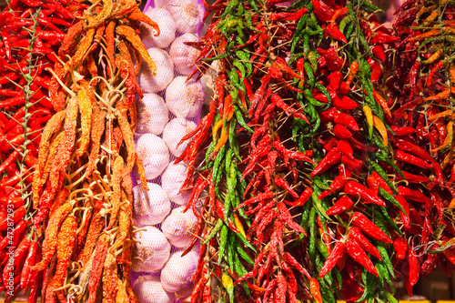 Photo: garlic and Red and green hot peppers background garlic and Red and green hot peppers background