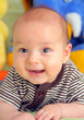 Portrait of a laughing, happy baby