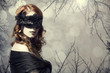 Beautiful women in carnival mask.