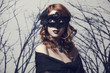 Beautiful women in carnival mask.
