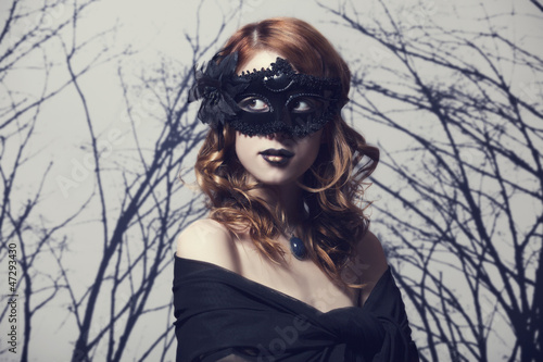 Photo: Beautiful women in carnival mask. Beautiful women in carnival mask.