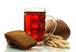 tankard of kvass and rye breads with ears, isolated on white