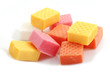 Photo: fruit caramel candy close-up on white background fruit caramel candy close-up on white background