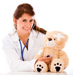 Doctor fixing a sick teddy bear