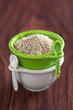 Photo: Grated dried green cheese with fenugreek, selective focus Grated dried green cheese with fenugreek, selective focus