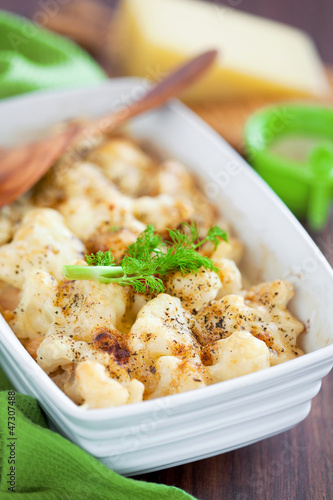Photo: Gratin of fennel and cauliflower with cheese, selective focus Gratin of fennel and cauliflower with cheese, selective focus