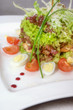 warm salad of vegetables and meat