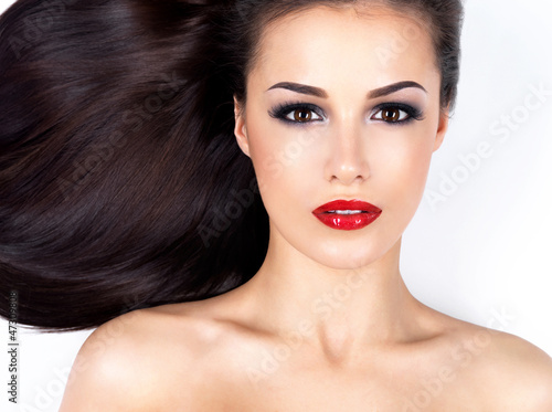 Photo: Beautiful woman with long straight brown hair Beautiful woman with long straight brown hair