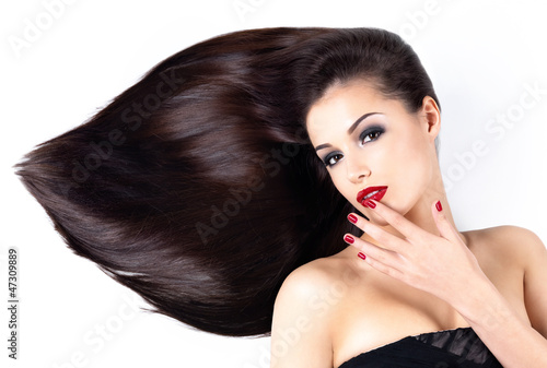 Photo: Woman with long straight hairs and elegance nails Woman with long straight hairs and elegance nails