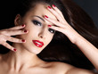 Beautiful woman with long brown straight hairs
