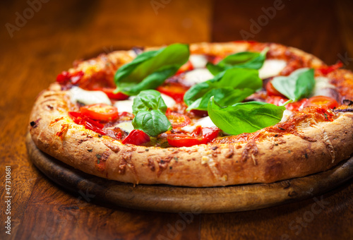 Photo: Pizza with salami and mozzarella Pizza with salami and mozzarella