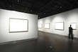 frames on white wall in art museum