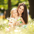 Mother and daughter in the park