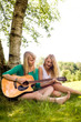 Girlfriends playing with the guitar