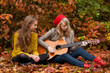 Playing guitar in the woods