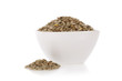 Brown lentils in a bowl isolated on a white background