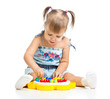 Cute child playing with  mosaic toy