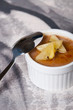 creme brulee with fresh slice fruits on top