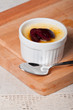 creme brulee with fresh slice fruits on top