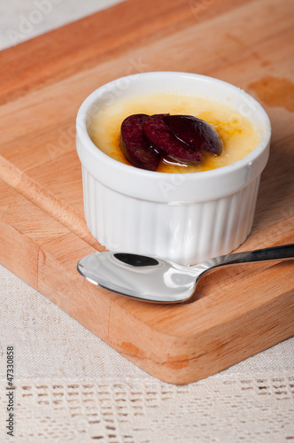 Photo: creme brulee with fresh slice fruits on top creme brulee with fresh slice fruits on top