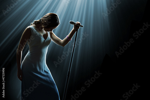 Photo: Female singer on the stage Female singer on the stage