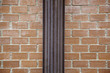 Brick wall with pipe