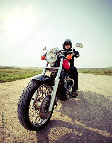 Photo: Biker on the country road Biker on the country road