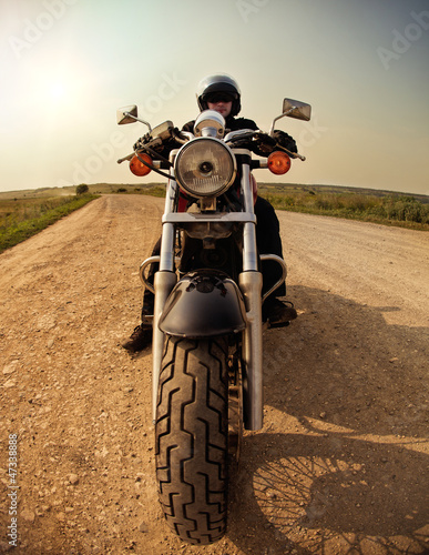 Photo: Biker on the country road Biker on the country road