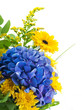 Bouquet from blue hydrangeas and yellow asters