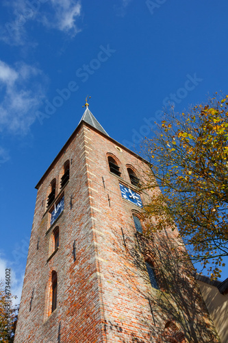 Photo: Church tower in northern Dutch village Church tower in northern Dutch village